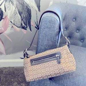 Like new miniature Coach purse. Perfect for on the go or teens!